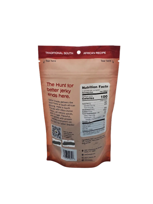 Back of Safari Snacks Spicy 4 oz pack with nutrition label on a white background